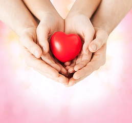 Image showing woman and man hands with heart