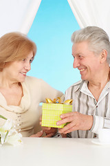 Image showing Charming older couple resting in the bedroom