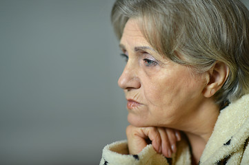 Image showing Sad aged woman