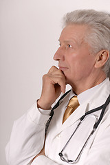 Image showing senior doctor on white