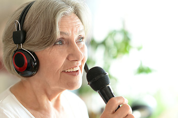 Image showing Senior woman singing