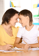 Image showing Mother and son are drawing