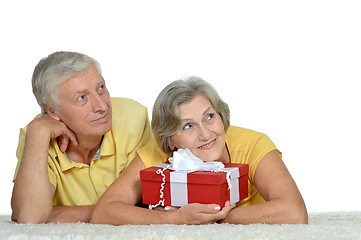 Image showing Happy older couple with gift