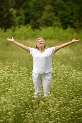 Image showing Senior woman on a walk