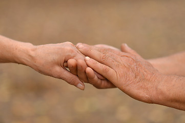 Image showing Hands against the fallen