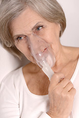 Image showing Woman making inhalation.