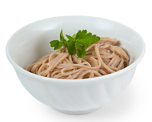 Image showing tasty dark pasta in a bowl isolated on white background