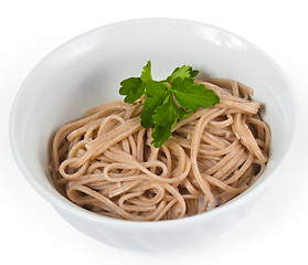 Image showing dark and pasta in a bowl isolated a on white background