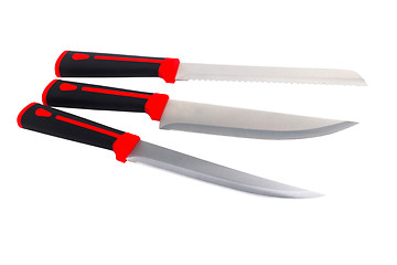 Image showing three red kitchen knife on white (clipping path)