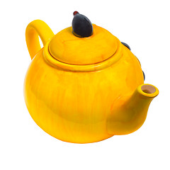 Image showing yellow teapot ceramic kettle tea isolated (clipping path)