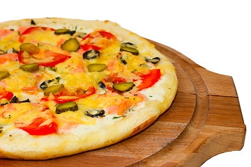 Image showing Pizza large tasty cucumber on white background (clipping path)