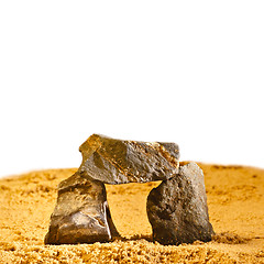 Image showing pile of stones on the sand
