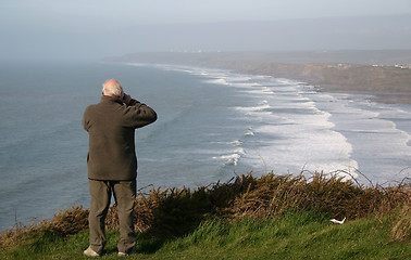 Image showing man on cliff-top