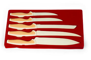 Image showing set red of knives for kitchen isolated