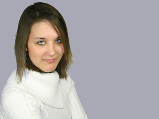 Image showing young female in a white jumper