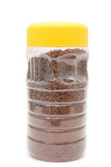 Image showing granular cocoa packaging plastic yellow bank isolated on a white
