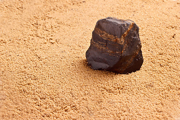 Image showing stone in the sand texture