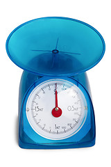 Image showing blue kitchen scale to red arrow isolated
