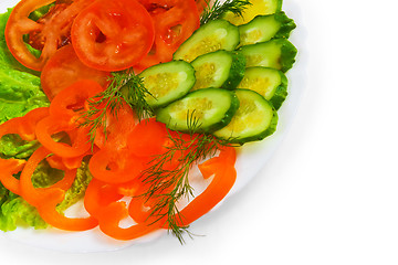 Image showing tomatoes cucumbers sliced salad plate isolated white background