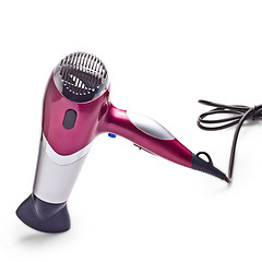 Image showing purple hair dryer is isolated on a white background