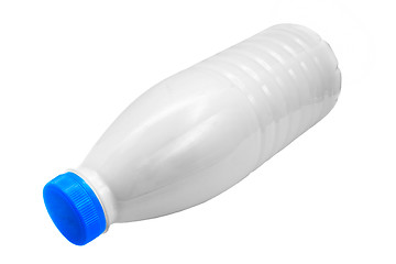 Image showing plastic milk bottle lies on side isolated on white (clipping pat