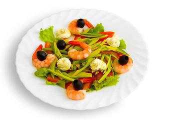Image showing Fresh Shrimp salad with olives and cream on a white background