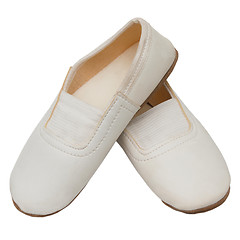 Image showing old children's white  pink pointe shoes ballet slippers isolated