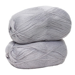 Image showing gray yarn for knitting isolated on white background