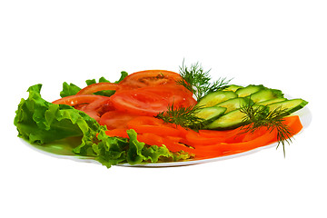 Image showing cucumbers tomatoes sliced tasty salad plate isolated on white ba