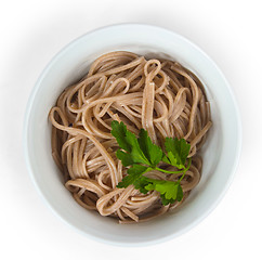 Image showing dark pasta in a bowl isolated on white background