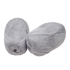 Image showing gray balls of yarn are isolated on a white background