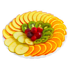 Image showing Salad of apples oranges grapes kiwi fruit slices on a plate isol