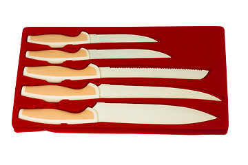 Image showing set red of knives for kitchen isolated (clipping path)