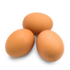 Image showing three eggs isolated on white 