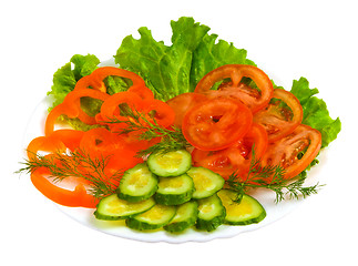 Image showing tomatoes cucumbers sliced?? salad plate isolated on white ba