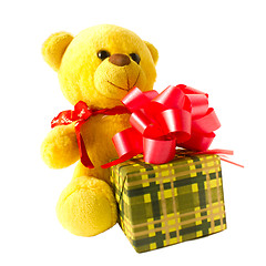 Image showing teddy bear paw isolated yellow and gift boxes