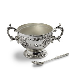 Image showing antique silver cup and spoon with a drop shadow