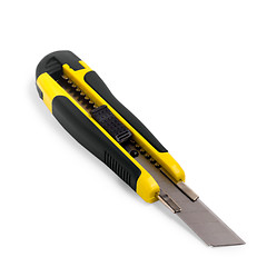 Image showing stationery knife yellow on a white background