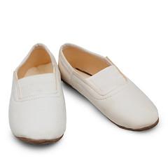 Image showing old children's white pointe shoes ballet slippers isolated