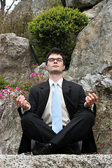 Image showing Meditating businessman