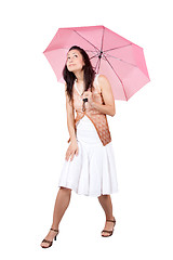 Image showing Woman with pink umbrella