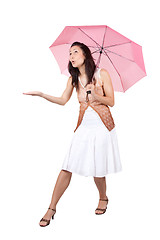 Image showing Woman with pink umbrella