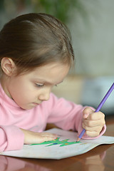 Image showing Little girl draws