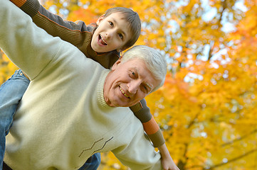 Image showing Grandparent and kid