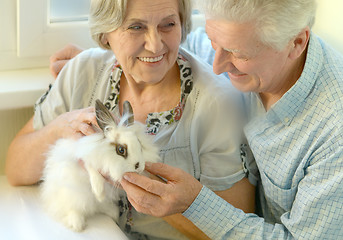 Image showing Senior couple with a rabbit