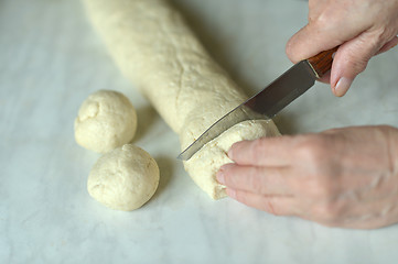 Image showing Woman making dough