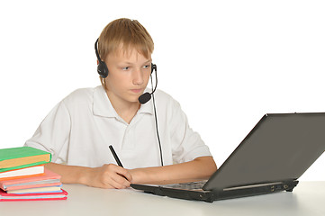 Image showing Teenage boy doing homework