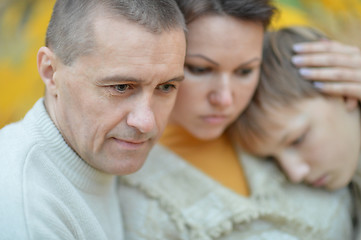 Image showing Sad family of three on the nature