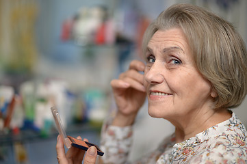 Image showing Nice woman in the bathroom