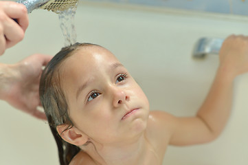 Image showing Little girl in bath